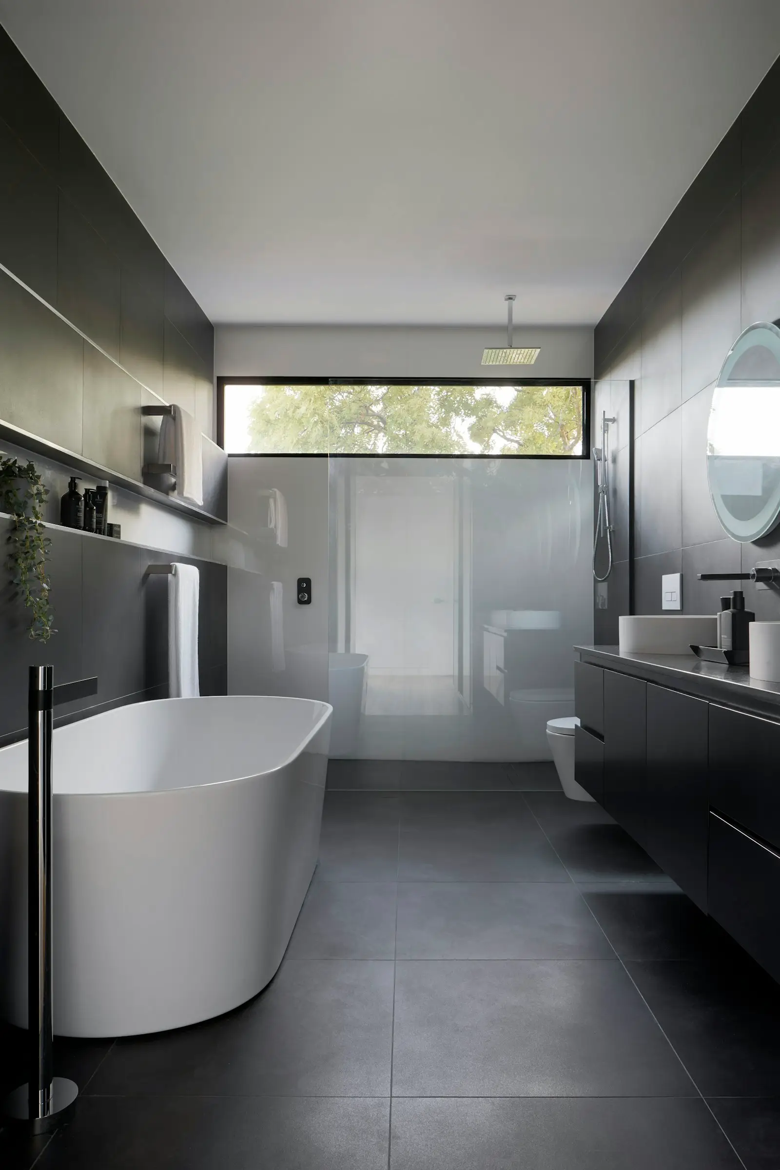 A clean, well-lit residential bathroom. Arlington.