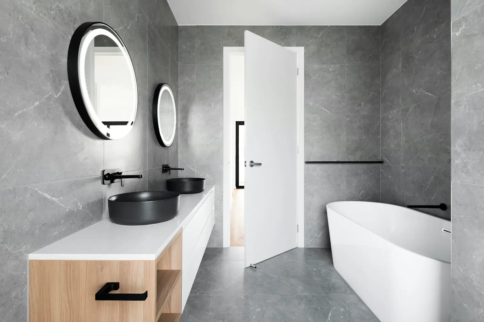 A clean, well-lit residential bathroom. Arlington.