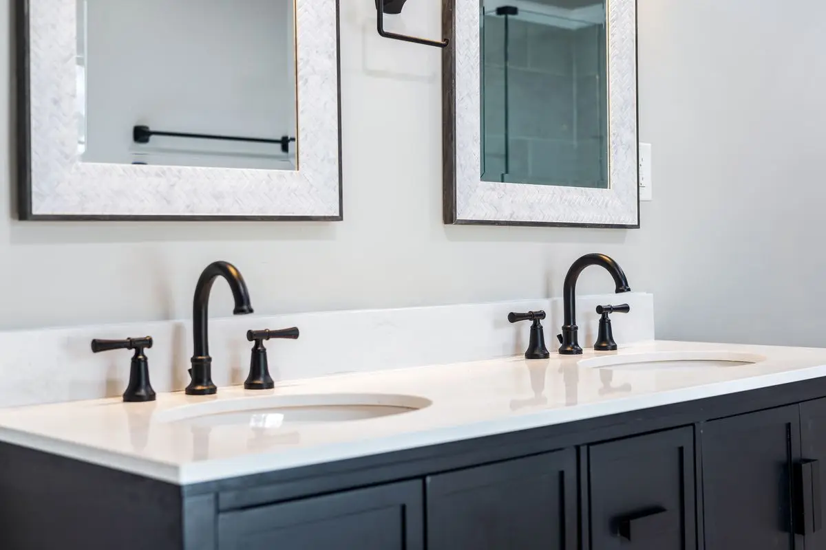 A clean, well-lit residential bathroom. Arlington.