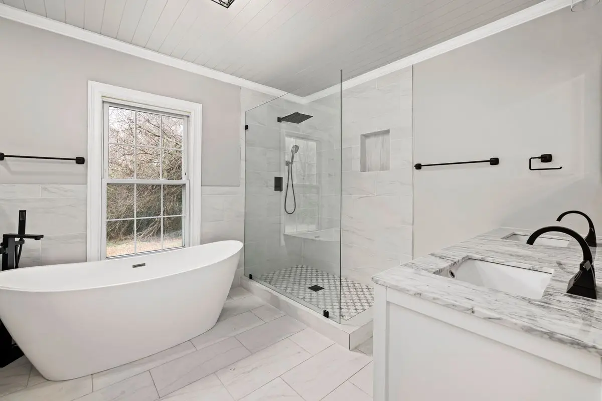 A clean, well-lit residential bathroom. Arlington.