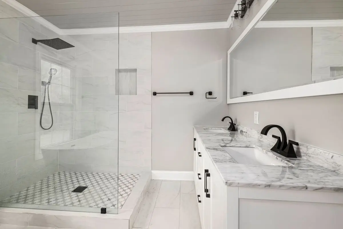 A clean, well-lit residential bathroom. Arlington.